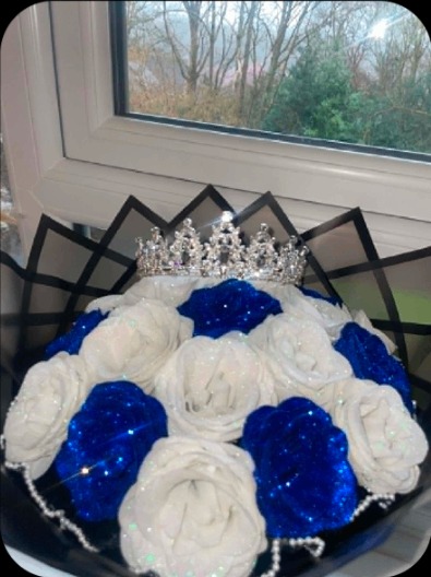 Blue and white rose bouquet with silver tiara